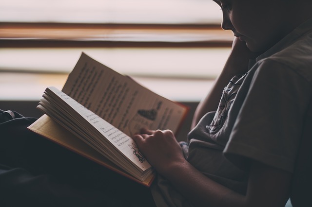 child reading a book