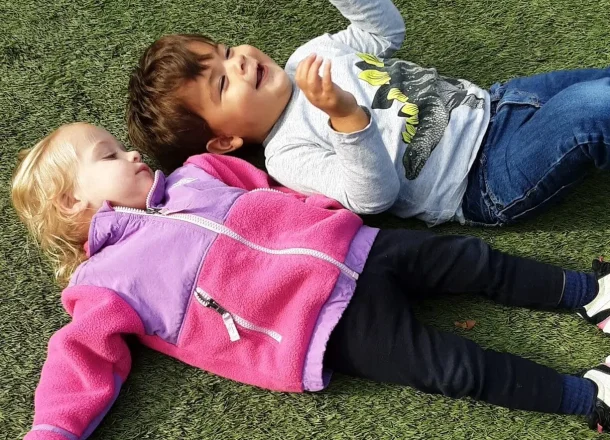 Children Playing on the grass at Children Central